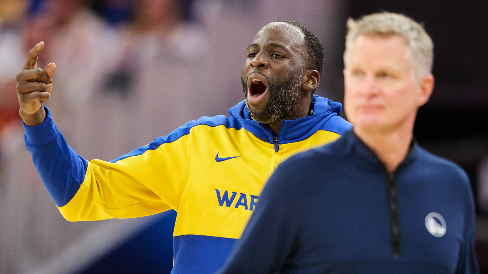 Warriors forward Draymond Green (23) and head coach Steve Kerr react to game play against the Phoenix Suns during the third quarter at Chase Center