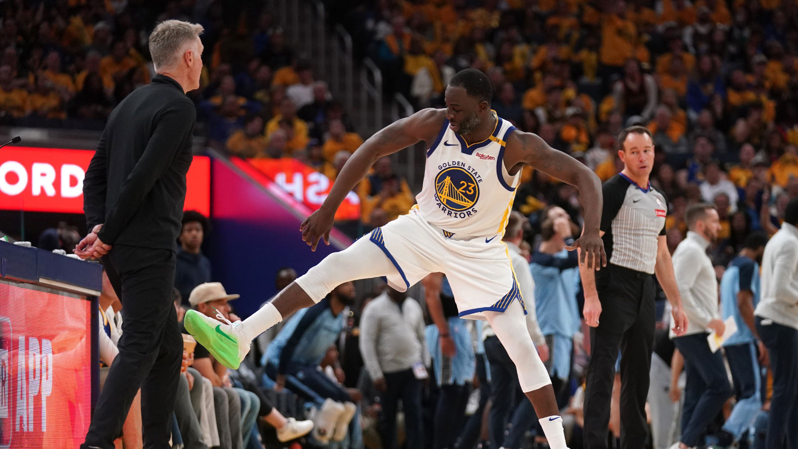 Warriors forward Draymond Green (23) reacts next to head coach Steve Kerr after the Warriors were called for a foul against the Memphis Grizzlies in the third quarter at the Chase Center