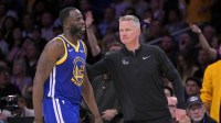 Warriors forward Draymond Green (23) walks past head coach Steve Kerr after fouling out in the second half of game six of the 2023 NBA playoffs at Crypto.com Arena
