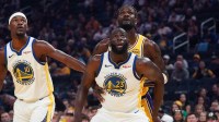 Golden State Warriors forward Jimmy Butler III (10) and forward Draymond Green (23) box out Los Angeles Lakers center Deandre Ayton (5) in the first quarter at Chase Center.