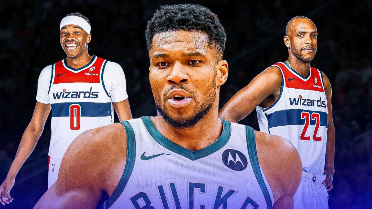 Bilal Coulibaly and Khris Middleton (Wizards) smile behind a sad Giannis