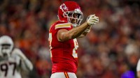 Kansas City Chiefs tight end Travis Kelce (87) celebrates after first down during the second quarter at GEHA Field at Arrowhead Stadium.