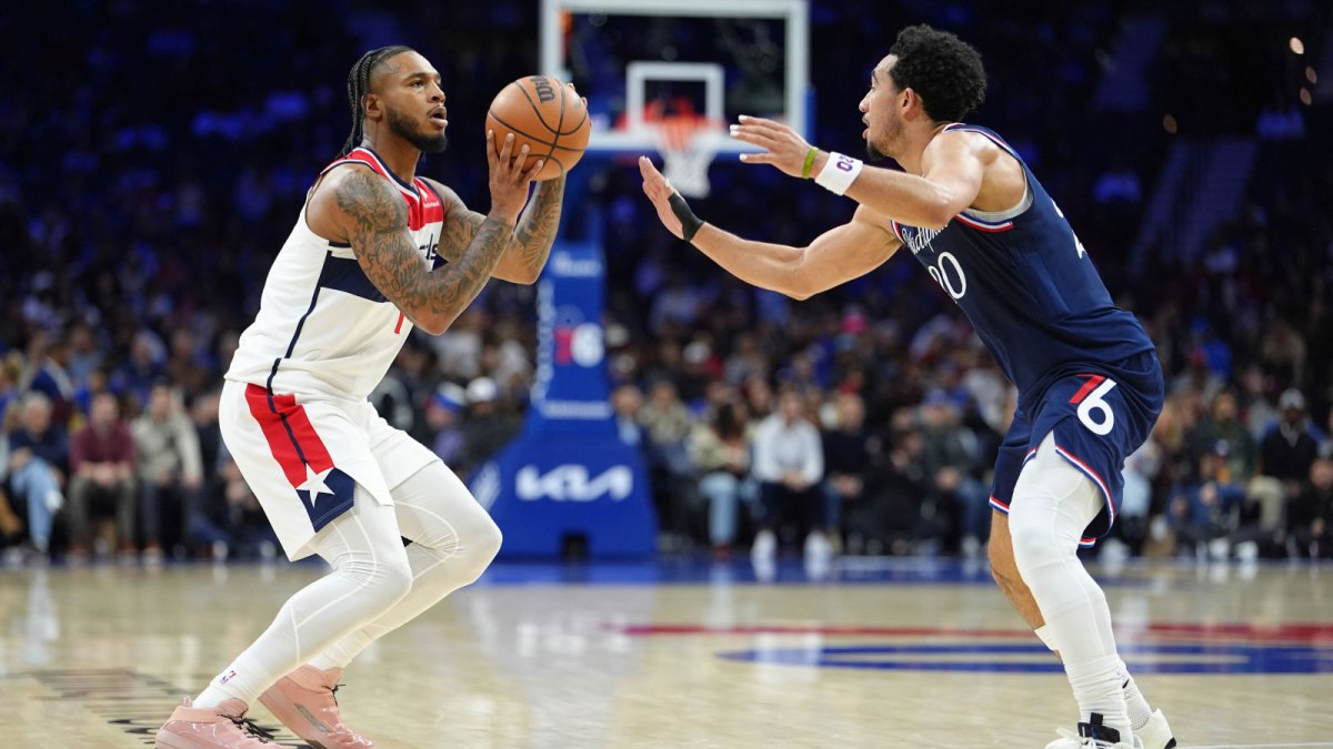 Washington Wizards forward Cam Whitmore (1) shoots the ball against Philadelphia 76ers guard Jared McCain (20) in the second quarter at Xfinity Mobile Arena.