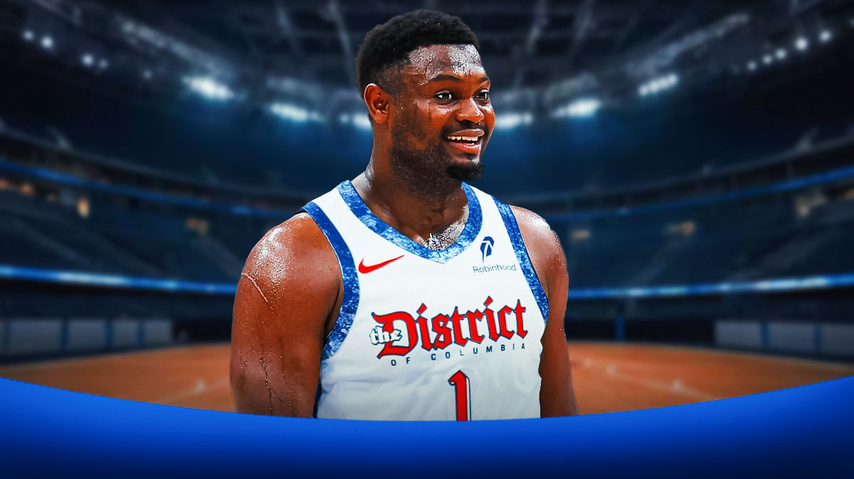 Zion Williamson smiles in a Wizards jersey