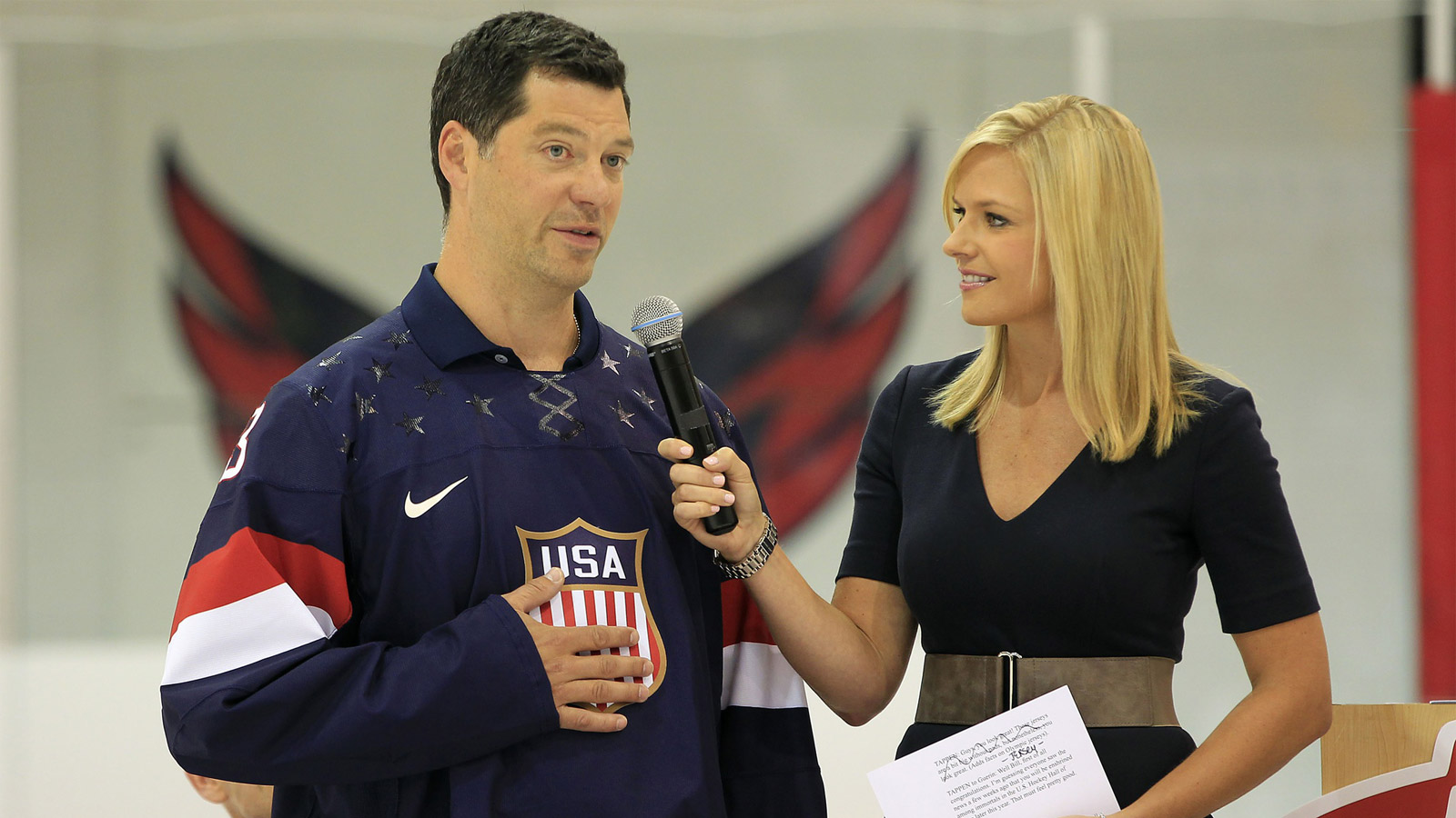 Aug 27, 2013; Arlington, VA, USA; Former NHL player and Olympic team member Bill Guerin (left) speak with NHL Network host Kathryn Tappen during a ceremony unveiling the 2014 USA olympic hockey jersey as part of the 2013 U.S. men's national team camp at Kettler Capitals Iceplex.