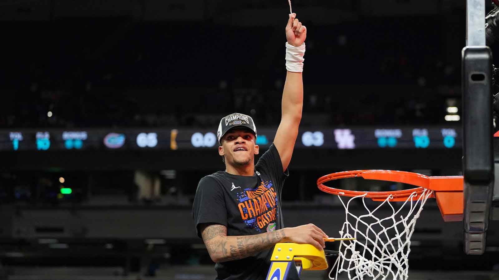 Florida Gators guard Will Richard (5) reacts after cutting down a piece of the net after winning the national championship game of the Final Four of the 2025 NCAA Tournament at the Alamodome.