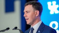 New Kentucky Wildcat head coach Will Stein makes remarks as he is introduced at Kentucky on Wednesday, December 3, 2025
