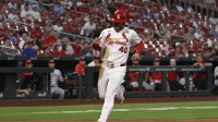 St. Louis Cardinals first baseman Willson Contreras (40) crosses home plate for a run against the Cincinnati Reds in the second inning at Busch Stadium.