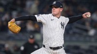 New York Yankees relief pitcher Caleb Ferguson (64) delivers a pitch during the eighth inning against the Oakland Athletics at Yankee Stadium.