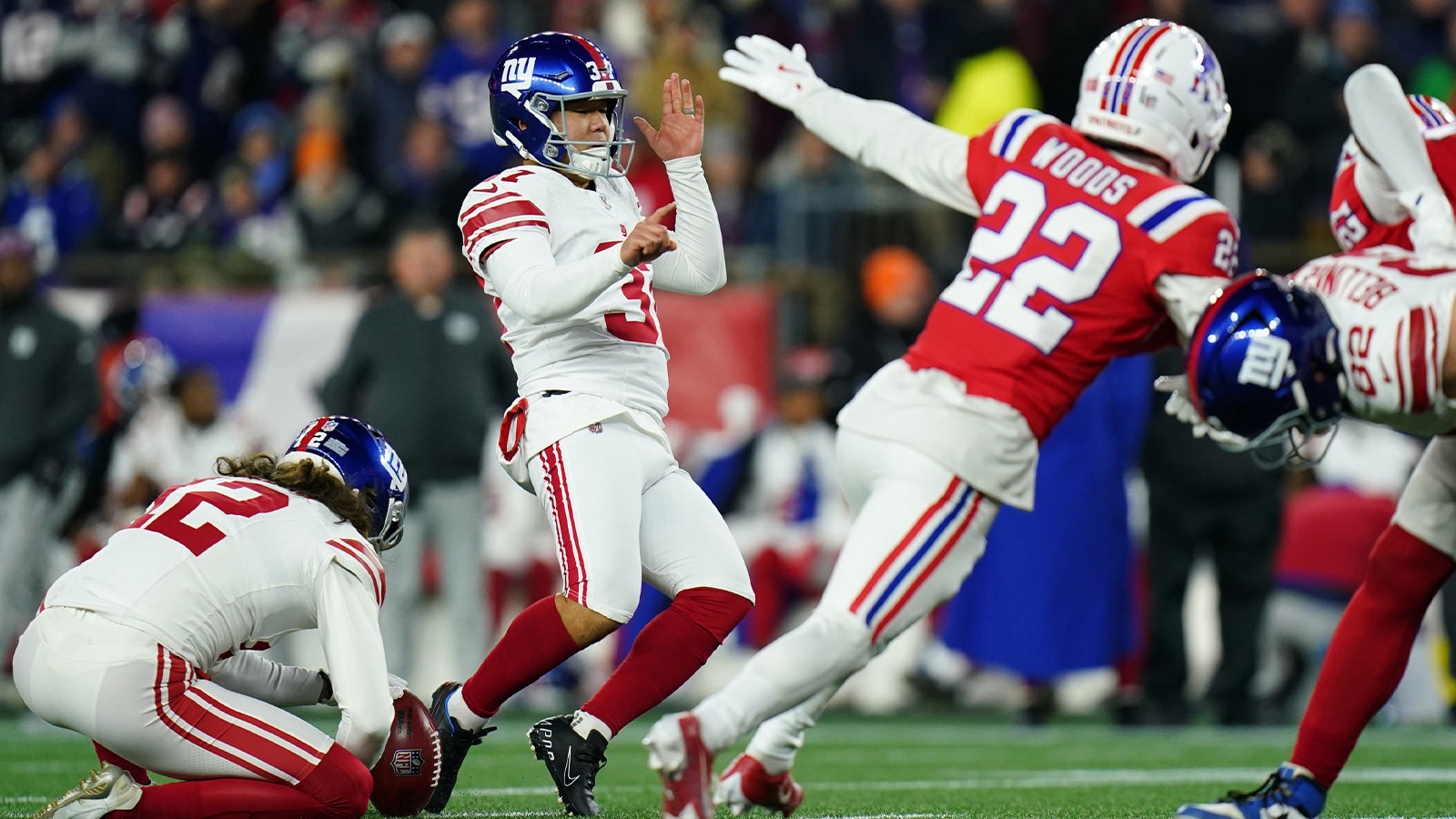 New York Giants place kicker Younghoe Koo (37) whiffs on a kick attempt during the second quarter against the New England Patriots at Gillette Stadium. 