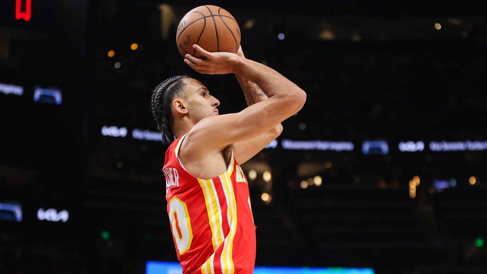Atlanta Hawks forward Zaccharie Risacher (10) shoots against the Denver Nuggets in the first quarter at State Farm Arena.