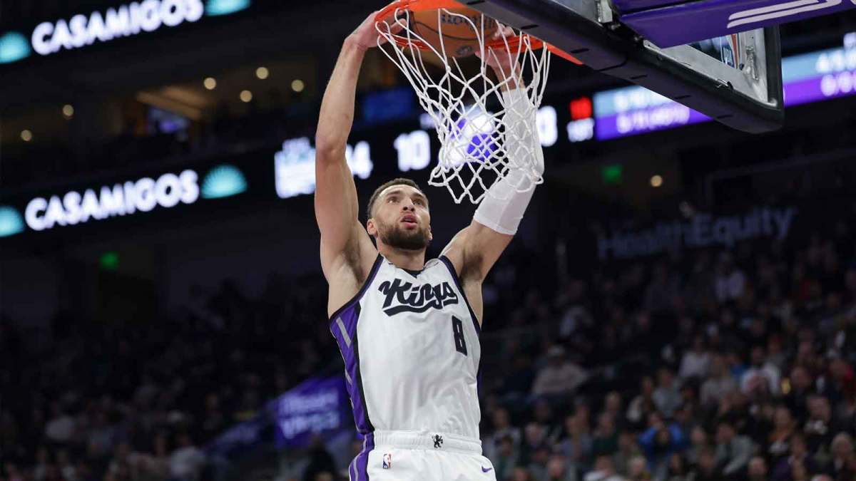 Sacramento Kings guard Zach LaVine (8) dunks the ball during the first quarter against the Utah Jazz at Delta Center.