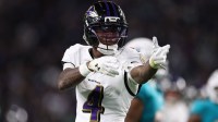 Baltimore Ravens wide receiver Zay Flowers (4) reacts after a runs for a gain during the third quarter against the Miami Dolphins at Hard Rock Stadium.