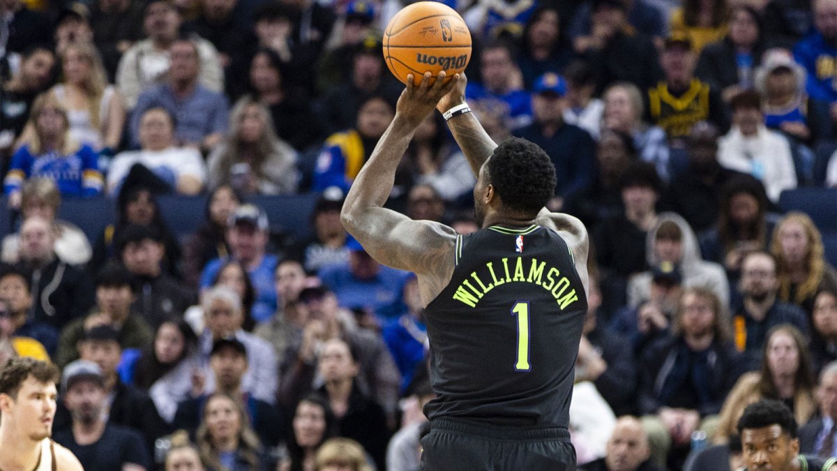 New Orleans Pelicans forward Zion Williamson (1) takes a three-point shot against the Golden State Warriors during the third quarter at Chase Center.