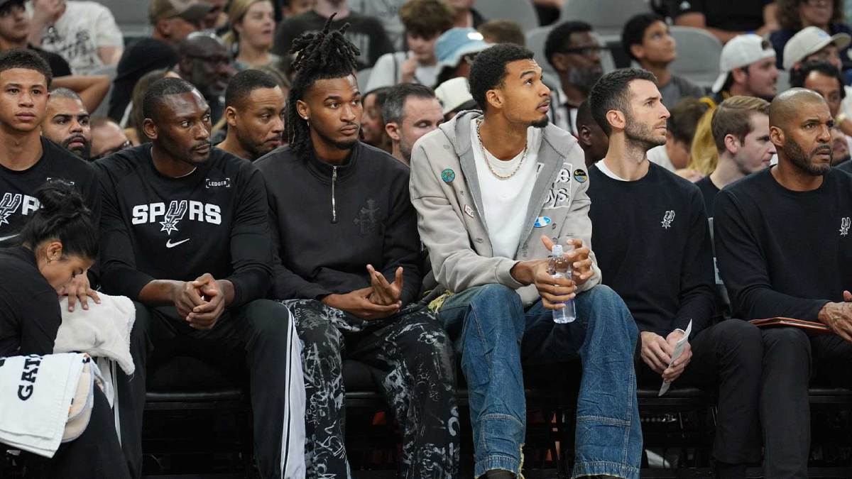 San Antonio Spurs guard Stephon Castle (5) and forward Victor Wembanyama (1) on the bench during the first half against the Memphis Grizzlies at Frost Bank Center.