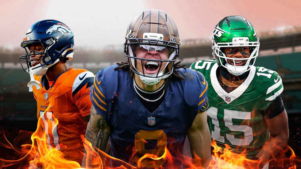 Christian Watson, Adonai Mitchell, Troy Franklin all beside each other, Flames in the background