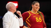 Iowa State's Audi Crooks talks with Iowa State head coach Bill Fennelly ahead of the second half against Drake on Nov. 20, 2025, at the Knapp Center in Des Moines.