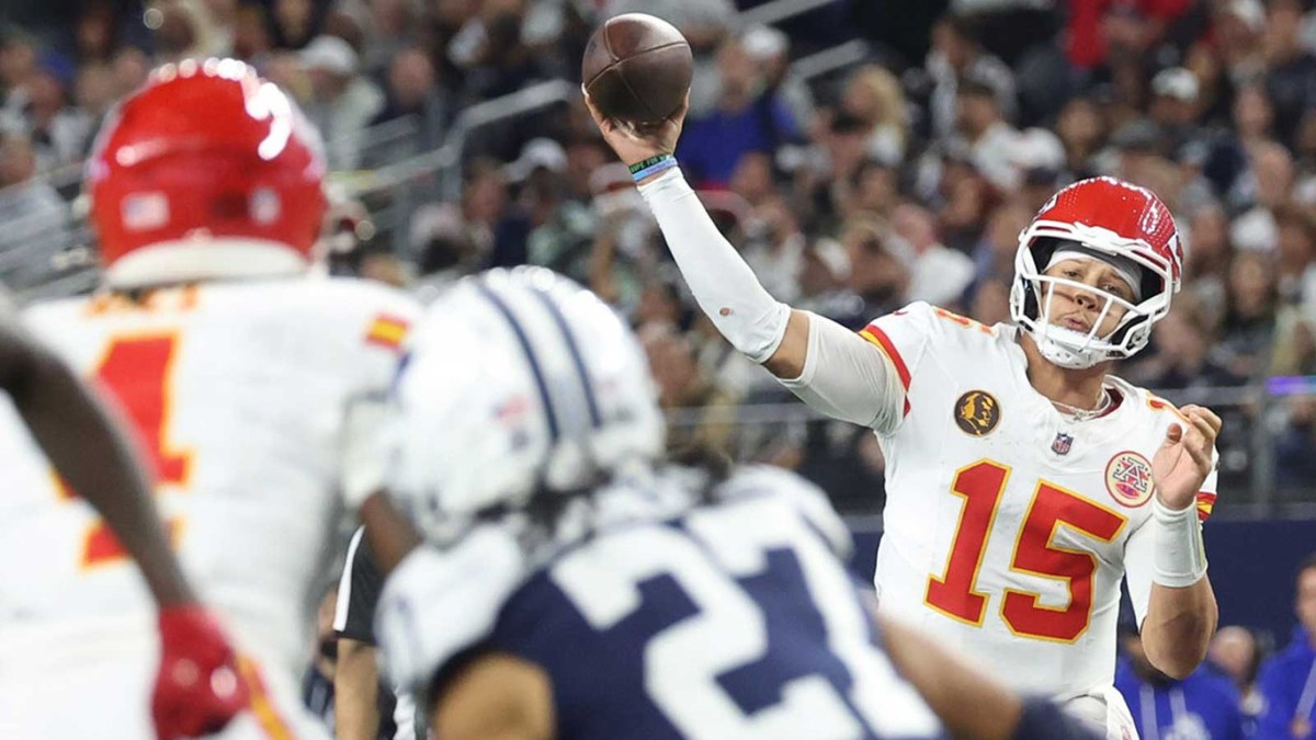Kansas City Chiefs quarterback Patrick Mahomes (15) throws a pass against the Dallas Cowboys during the fourth quarter at AT&T Stadium.