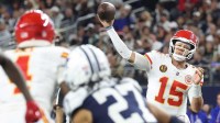 Kansas City Chiefs quarterback Patrick Mahomes (15) throws a pass against the Dallas Cowboys during the fourth quarter at AT&T Stadium.