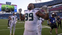 Seattle Seahawks defensive end Leonard Williams (99) reacts after a game against the Tennessee Titans at Nissan Stadium.