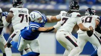 Indianapolis Colts defensive tackle Adetomiwa Adebawore (95) works to get to Houston Texans quarterback C.J. Stroud (7) on Sunday, Nov. 30, 2025, during a game at Lucas Oil Stadium in Indianapolis.