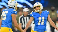 Los Angeles Chargers punter JK Scott (16) and place kicker Cameron Dicker (11) celebrate after a field goal against the Pittsburgh Steelers during the second quarter of the game at SoFi Stadium.