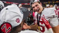 Indiana's Fernando Mendoza (15) celebrates after the Indiana versus Ohio State Big Ten Championship football game at Lucas Oil Stadium on Saturday, Dec. 6, 2025.