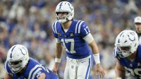 Indianapolis Colts quarterback Daniel Jones (17) yells at the line of scrimmage during a game against the Houston Texans at Lucas Oil Stadium.