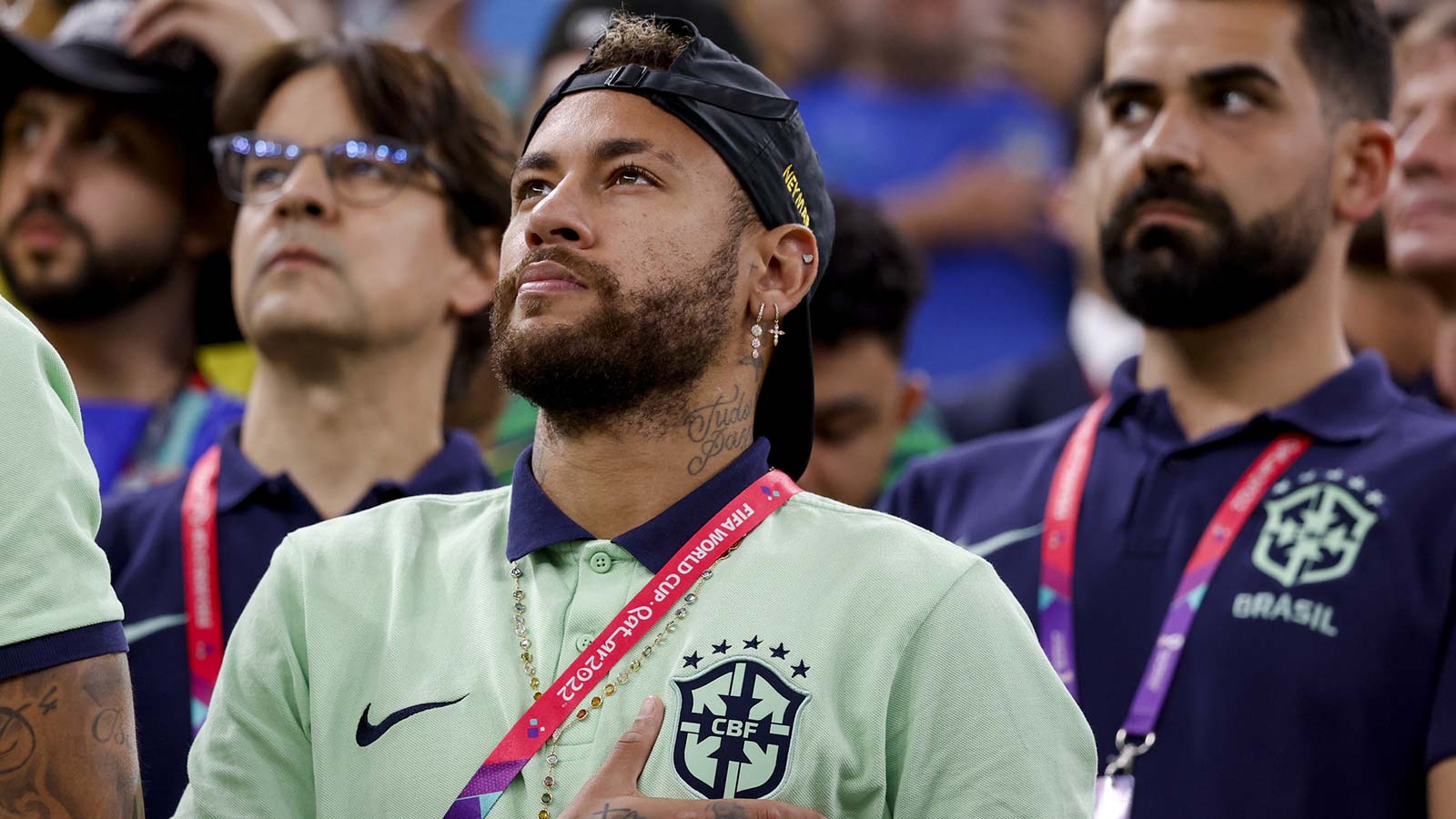 Brazil s Neymar is seen during the national anthem prior to the match against Cameroon during a group stage match during the 2022 World Cup at Lusail Stadium.