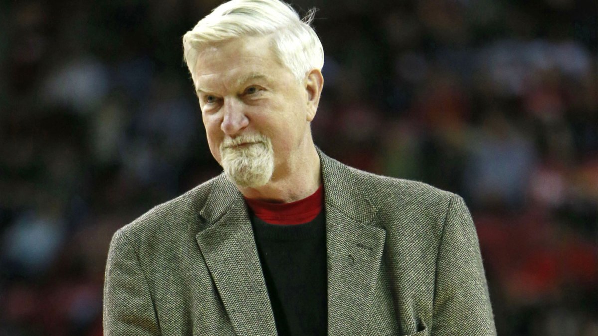Maryland Terrapins former player Tom McMillen acknowledges fans during the game against the Virginia Cavaliers at Comcast Center.