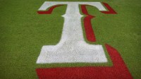 A view of the Texas Rangers logo on the field before the game between the Baltimore Orioles and the Rangers in game three of the ALDS for the 2023 MLB playoffs at Globe Life Field.