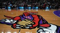; A view of the Toronto Raptors logo at center court for its city connect game against the Boston Celtics at Scotiabank Arena.