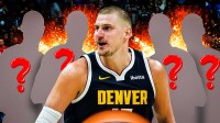 Nikola Jokic in the middle, Four mystery players all around him, Explosions in the background