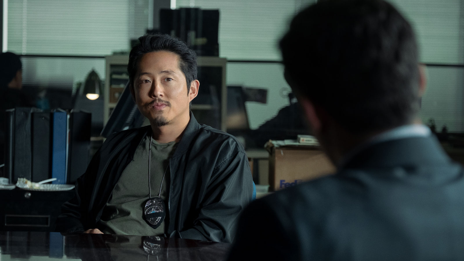 Steven Yeun in The Rip.