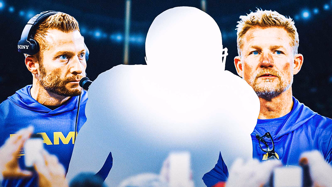 Mystery player in the middle, Coach Sean McVay and GM Les Snead around him, NFL Draft wallpaper in the background