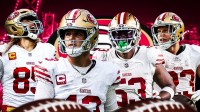 Brock Purdy, Christian McCaffrey, George Kittle, Dee Winters all beside each other, 49ers wallpaper in the background