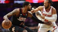 76ers forward Paul George (8) controls the ball