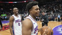 76ers guard Kyle Lowry (7) and guard Tyrese Maxey (0) smile