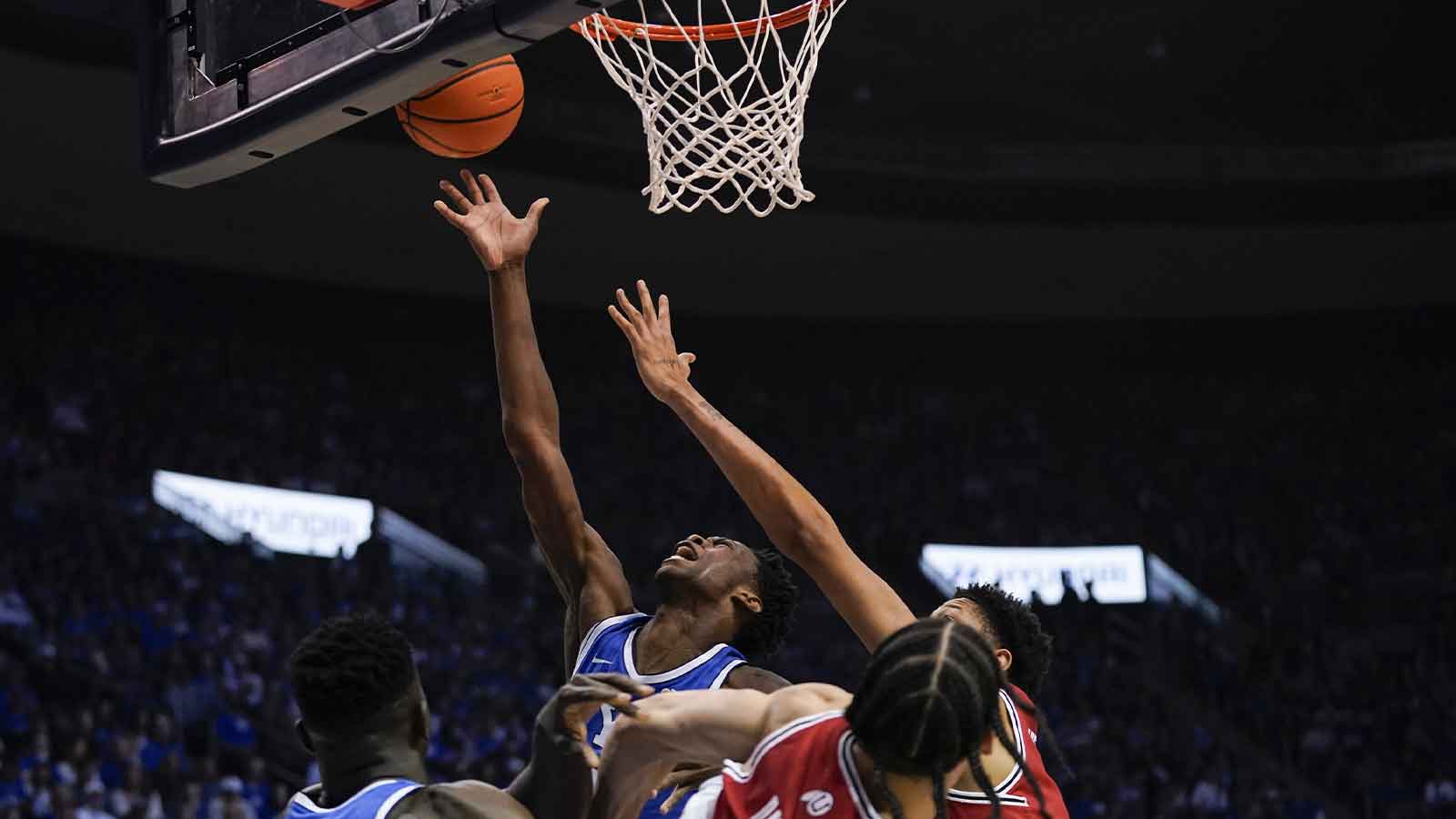 BYU Cougars forward AJ Dybantsa (3) makes a driving layup during the first half against the Utah Utes at Marriott Center.