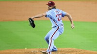 Philadelphia Phillies pitcher Aaron Nola (27) pitches during the first inning against the Los Angeles Dodgers during game three of the NLDS round for the 2025 MLB playoffs at Dodger Stadium.