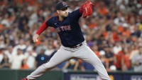 Boston Red Sox relief pitcher Adam Ottavino (0) throws the ball in the eighth inning against the Houston Astros during game six of the 2021 ALCS at Minute Maid Park.