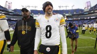 Pittsburgh Steelers head coach Mike Tomlin and quarterback Aaron Rodgers (8) walk off the field after the game against the Baltimore Ravens at M&T Bank Stadium.