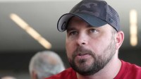 Arizona Cardinals offensive line coach Klayton Adams speaks with the media as he is introduced as a new hire with fellow coaches at the Cardinals facility in Tempe on March 8, 2023. Nfl Cardinals Offensive Assistant Coaches Introduction