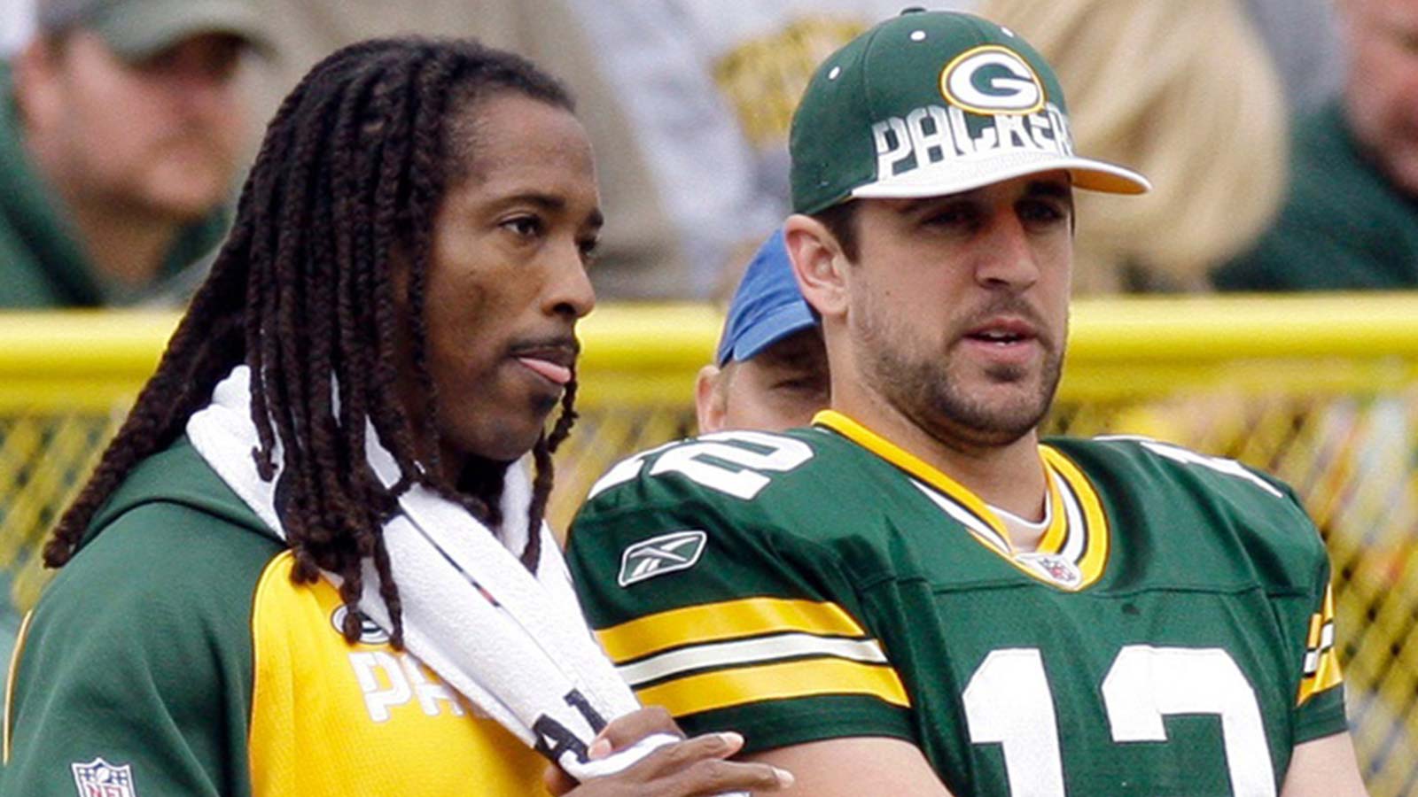 Green Bay Packers cornerback Al Harris (left) talks with quarterback Aaron Rodgers during the second quarter of their game against the Buffalo Bills on Sept. 19, 2010, at Lambeau Field.
