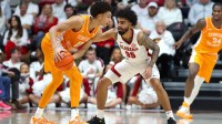 Alabama Crimson Tide guard Houston Mallette (95) guards Tennessee Volunteers forward Nate Ament (10) during the second half at Coleman Coliseum.