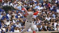 Boston Red Sox third baseman Alex Bregman (2) hits a three run home run against the Chicago Cubs during the eighth inning at Wrigley Field.