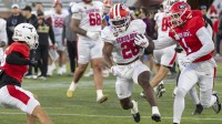 American Team running back Kaelon Black (26) of Indiana runs the ball during American Senior Bowl practice at Hancock Whitney Stadium.