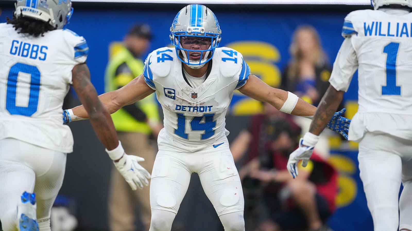 Detroit Lions running back Jahmyr Gibbs (0), Detroit Lions wide receiver Amon-Ra St. Brown (14) and Detroit Lions wide receiver Jameson Williams (1) celebrate after a touchdown during the second quarter against the Los Angeles Rams at SoFi Stadium.