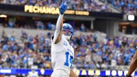 Detroit Lions wide receiver Amon-Ra St. Brown (14) celebrates after a touchdown during the second quarter against the Los Angeles Rams at SoFi Stadium.