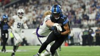 Minnesota Vikings linebacker Andrew van Ginkel (43) tackles Detroit Lions wide receiver Amon-Ra St. Brown (14) after a reception in the second quarter at U.S. Bank Stadium.